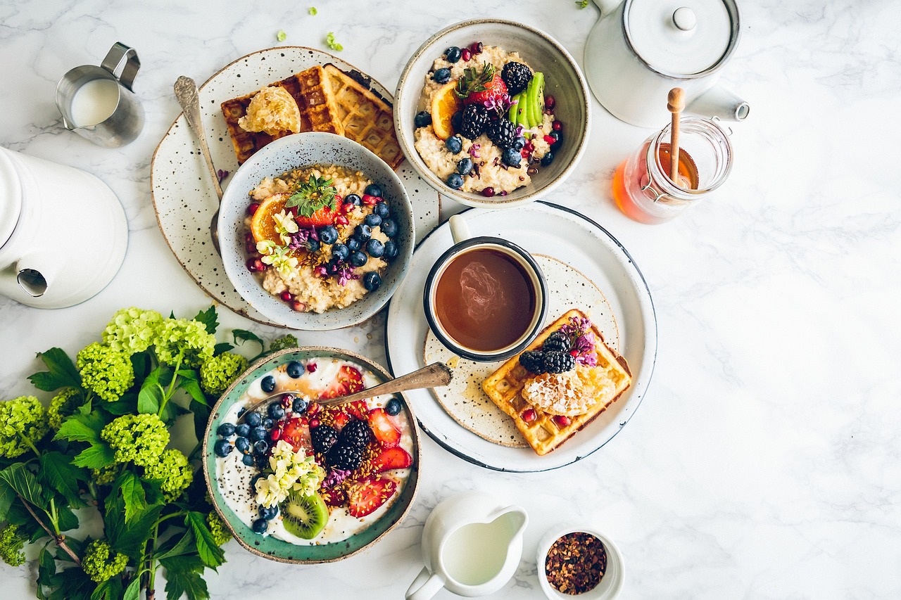 Healthy food items arranged on a table in natural light